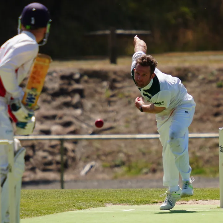 A Woodend senior bowler in his delivery stride