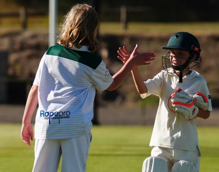 An Under 11 batter and keeper
